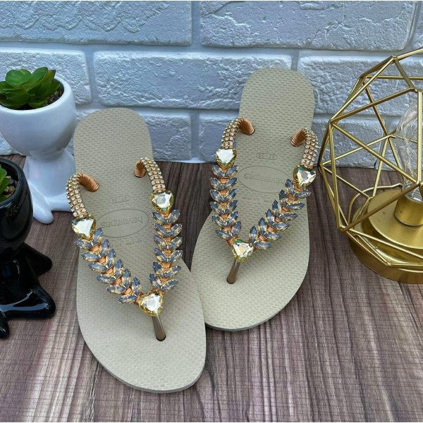 Gray women slippers decorated with gorgeous stones